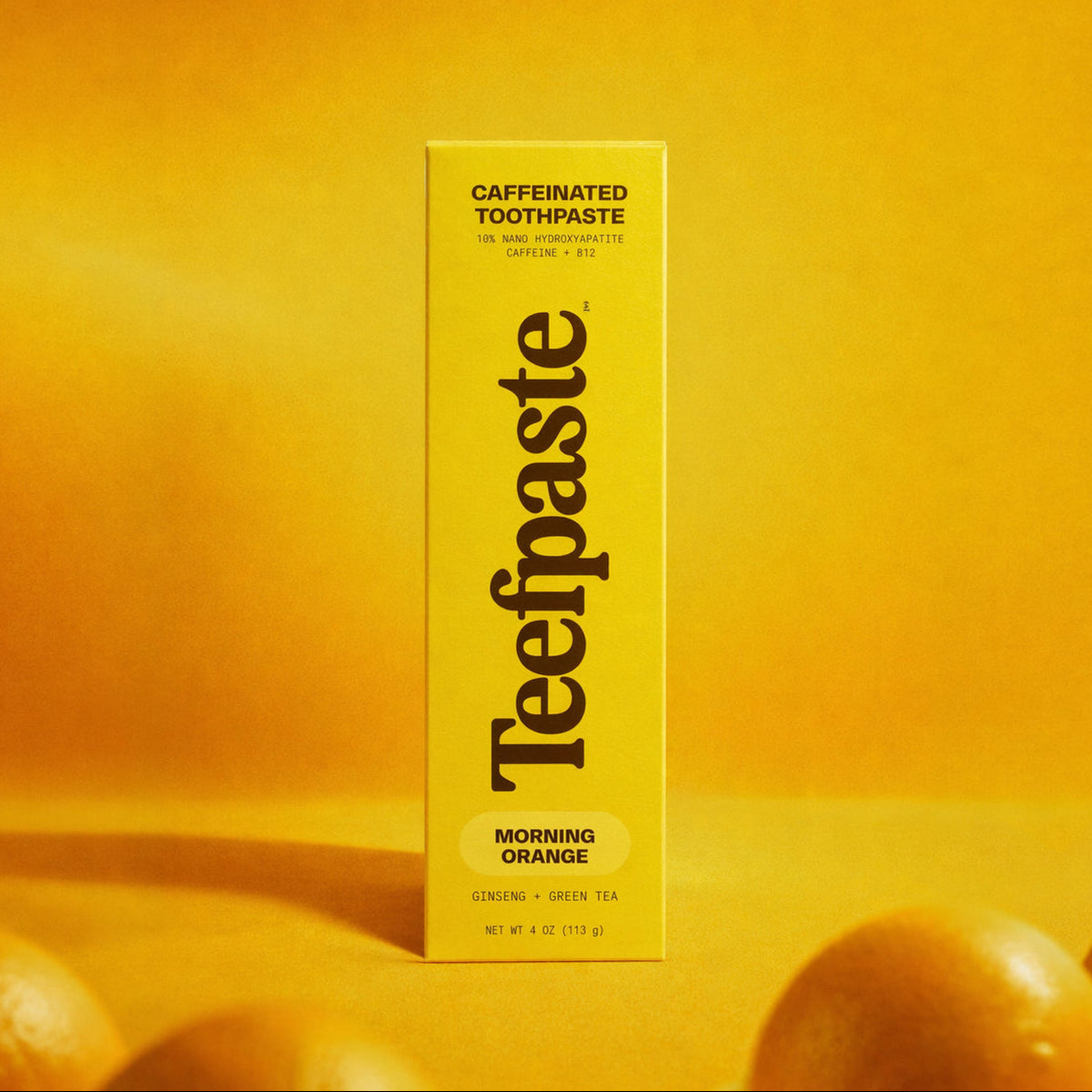 Box of Teefpaste caffeinated toothpaste on a yellow background