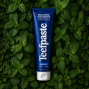 Teefpaste Night tube on a pile of mint leaves