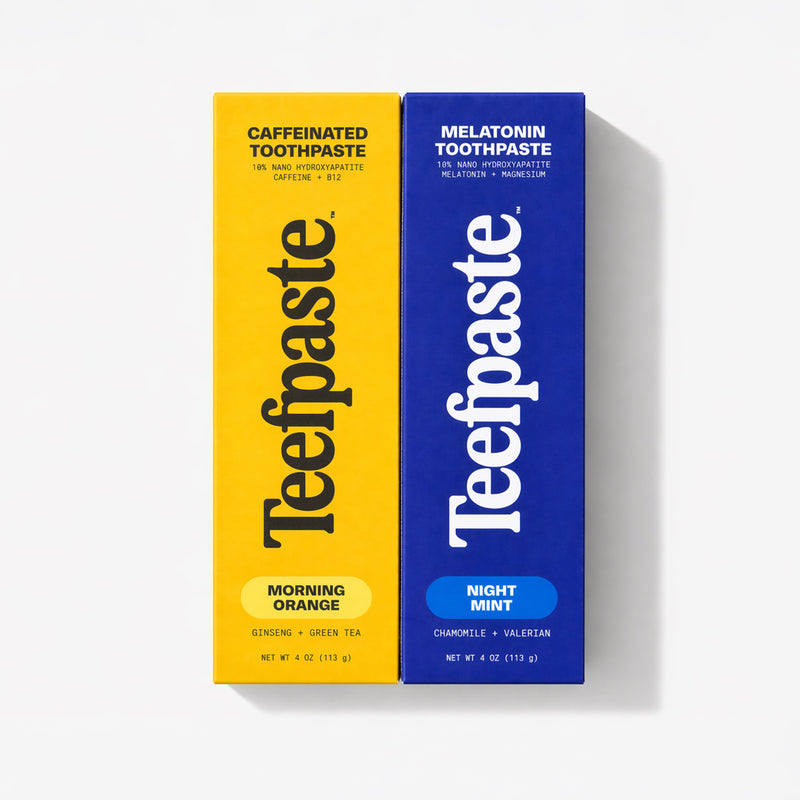 Two boxes of Teefpaste toothpaste, one yellow and one blue, on a white background.