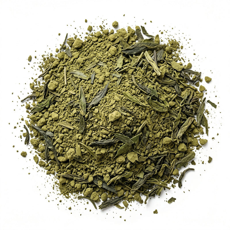 Green tea leaves and powder on a white background